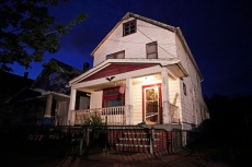 CLEVELAND, OH, - The house where three women who disappeared as teens about a decade ago were found alive on Monday is shown May 7, 2013 in Cleveland, Ohio. Amanda Berry, who went missing in 2003, Gina DeJesus, who went missing in 2004, and Michelle Knight, who went missing in 2002, were all found alive in the same house. Three suspects, all brothers, have been taken into custody. (Photo by Bill Pugliano/Getty Images)